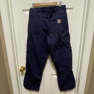 Carhart flame-resistant, relaxed fit utility work pants in navy blue